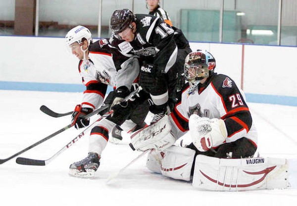 Pirates goaltender Mark Visentin makes a blocker save as Daine Todd of Portland battles Brandon Kozun of Manchester in third period action from Saco. Pirates goaltender Mark Visentin makes a blocker save as Daine Todd of Portland battles Brandon Kozun of Manchester in third period action from Saco.