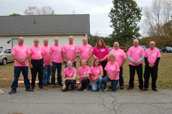 Members of the Searsport Volunteer Fire Department used both their hearts and their heads, or at least their hair, when they shaved their heads earlier this month to raise money for a firefighter's relative who is fighting breast cancer. Members of the Searsport Volunteer Fire Department used both their hearts and their heads, or at least their hair, when they shaved their heads earlier this month to raise money for a firefighter's relative who is fighting breast cancer.