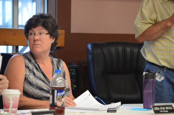 Dexter Town Manager Linda-Jean Briggs looks over at a town councilor during a public hearing for a moratorium on east-west corridor development on Thursday, June 13, 2013. Dexter Town Manager Linda-Jean Briggs looks over at a town councilor during a public hearing for a moratorium on east-west corridor development on Thursday, June 13, 2013.