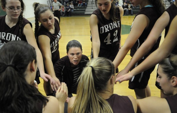 Orono High School head coach Jessica Witham, (kneeling in center) huddles with her Red Riots players during a game in 2011. Witham is among six people who will be inducted into the Orono High School Athletic Hall of Fame Friday night. Orono High School head coach Jessica Witham, (kneeling in center) huddles with her Red Riots players during a game in 2011. Witham is among six people who will be inducted into the Orono High School Athletic Hall of Fame Friday night.