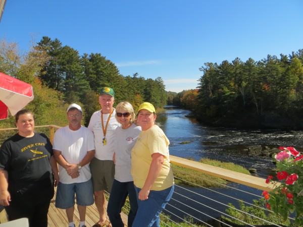 Several members of the Island Falls team that has worked on reviving the town's economy stands on the back deck of the new River Cafe. From left are Libby Moulton, Skip Lewin, Pete Connelly, Cheryl Connelly and Tabby York. Several members of the Island Falls team that has worked on reviving the town's economy stands on the back deck of the new River Cafe. From left are Libby Moulton, Skip Lewin, Pete Connelly, Cheryl Connelly and Tabby York.