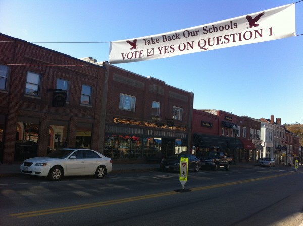A sign across Main Street urged voters to vote to withdraw from RSU 24. A sign across Main Street urged voters to vote to withdraw from RSU 24.