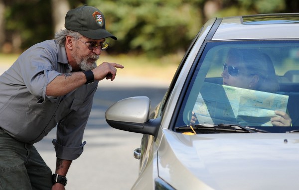 Acadia National Park heavy equipment mechanic Ray Sanborn offers directions to a tourist who wanted to see as much of Acadia as possible despite the federal government shutdown and the closure of the park on Tuesday. Acadia National Park heavy equipment mechanic Ray Sanborn offers directions to a tourist who wanted to see as much of Acadia as possible despite the federal government shutdown and the closure of the park on Tuesday.