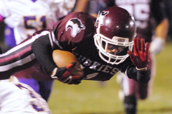 Maine Central Institute's Jonathan Santiago gets hauled down by a Bucksport defender during first-quarter action in Pittsfield Friday night. Maine Central Institute's Jonathan Santiago gets hauled down by a Bucksport defender during first-quarter action in Pittsfield Friday night.