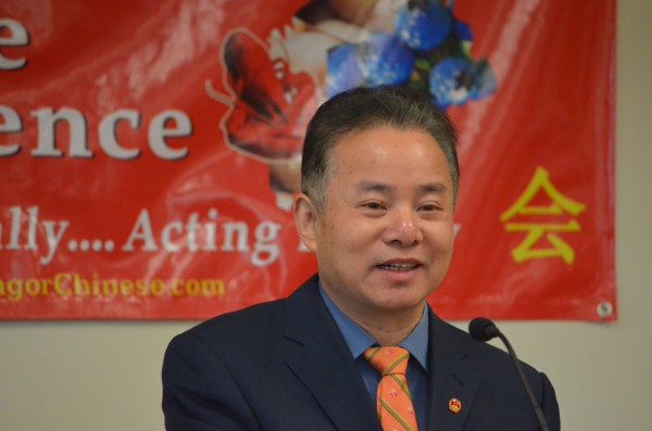 Cen Jianjun, education counselor of Chinese Consulate in New York, talks about the importance of the relationship between the United States and China during the Maine Chinese Conference held at the Dyke Center for Family Business at Husson University in Bangor on Friday. Cen Jianjun, education counselor of Chinese Consulate in New York, talks about the importance of the relationship between the United States and China during the Maine Chinese Conference held at the Dyke Center for Family Business at Husson University in Bangor on Friday.