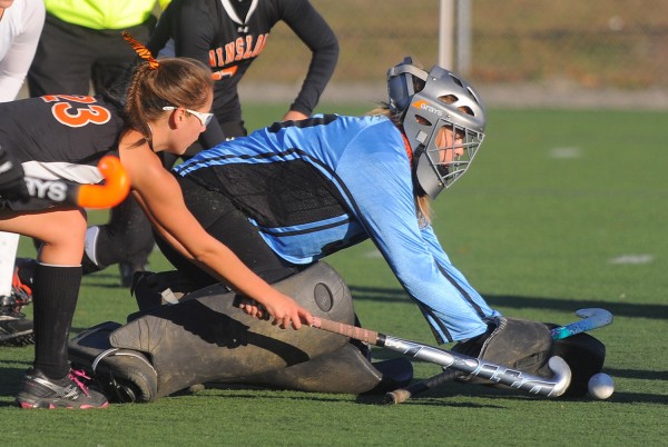 Foxcroft Academy's goalkeeper Brianna Skolfield (right) covers the ball as Winslow's Delaney Wood tries to hit it during the first half of the Eastern Maine Class C championship game in Hampden on Tuesday. Foxcroft Academy's goalkeeper Brianna Skolfield (right) covers the ball as Winslow's Delaney Wood tries to hit it during the first half of the Eastern Maine Class C championship game in Hampden on Tuesday.