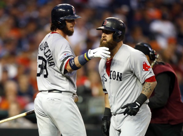 Boston's Mike Napoli (right) celebrates his home run against the Detroit Tigers with Red Sox teammate Jarrod Saltalamacchia during the seventh inning in game three of the American League Championship Series at Comerica Park in Detroit Tuesday. Boston's Mike Napoli (right) celebrates his home run against the Detroit Tigers with Red Sox teammate Jarrod Saltalamacchia during the seventh inning in game three of the American League Championship Series at Comerica Park in Detroit Tuesday.