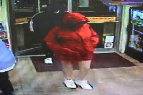 Brunswick police are searching for a man and woman who allegedly robbed the Big Apple store on Pleasant Street Friday night. The woman is described as 5 feet, 4 inches tall, 220-240 pounds, and was wearing a red hooded winter coat, bare legs and white sneakers. Brunswick police are searching for a man and woman who allegedly robbed the Big Apple store on Pleasant Street Friday night. The woman is described as 5 feet, 4 inches tall, 220-240 pounds, and was wearing a red hooded winter coat, bare legs and white sneakers.