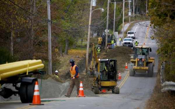 Bangor Gas and other construction crews prepare the side of Bennoch Road for natural gas pipeline installation Wednesday morning in Orono. Bangor Gas and other construction crews prepare the side of Bennoch Road for natural gas pipeline installation Wednesday morning in Orono.
