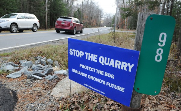 A sign against opening up a quarry at the end of Kelley Road is seen at the end of a driveway on Stillwater Ave in Orono on Thursday. A sign against opening up a quarry at the end of Kelley Road is seen at the end of a driveway on Stillwater Ave in Orono on Thursday.