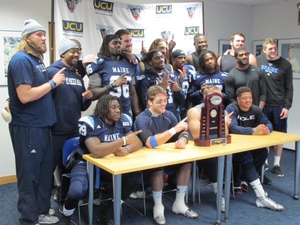 The senior members of the University of Maine football team pose with the Colonial Athletic Association championship trophy during the press conference after Saturday's 41-0 victory over Rhode Island at Alfond Stadium in Orono. The sixth-ranked Black Bears have earned a spot in the Football Championship Subdivision playoffs. The senior members of the University of Maine football team pose with the Colonial Athletic Association championship trophy during the press conference after Saturday's 41-0 victory over Rhode Island at Alfond Stadium in Orono. The sixth-ranked Black Bears have earned a spot in the Football Championship Subdivision playoffs.