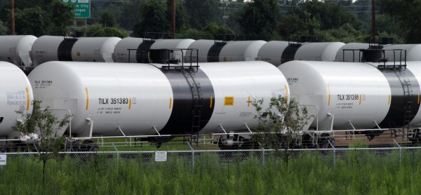 Railroad tank cars are unloaded on a loop track at a refinery in Delaware City, Delaware. July 28, 2013. The refinery receives 110,000 barrels of crude oil a day, which is about 150 cars, or two trainloads. The shipments originate in the Bakken region of North Dakota, the center of a new American oil boom. With a shortage of new pipeline capacity, oil producers have been using rail as an alternative, and in some cases it's the preferred mode. Railroad tank cars are unloaded on a loop track at a refinery in Delaware City, Delaware. July 28, 2013. The refinery receives 110,000 barrels of crude oil a day, which is about 150 cars, or two trainloads. The shipments originate in the Bakken region of North Dakota, the center of a new American oil boom. With a shortage of new pipeline capacity, oil producers have been using rail as an alternative, and in some cases it's the preferred mode.