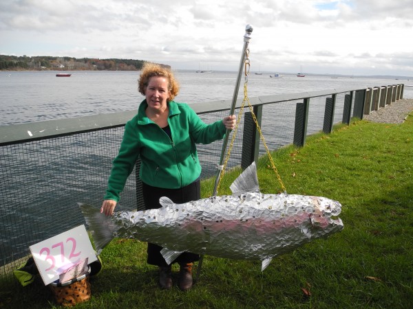 Sally Jones of Bangor brought her silver salmon to the Wednesday press conference held by opponents of a major dredging project. "We need to be mindful of all the creatures we share Penobscot Bay with," she said. Sally Jones of Bangor brought her silver salmon to the Wednesday press conference held by opponents of a major dredging project. "We need to be mindful of all the creatures we share Penobscot Bay with," she said.