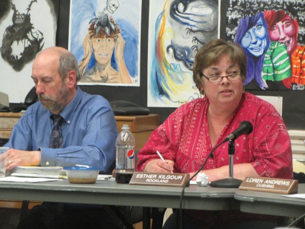 Regional School Unit 13 Superintendent Lew Collins (left) and board chairwoman Esther "Tess" Kilgour listen to debate on the proposed merger of the district's two middle schools. Regional School Unit 13 Superintendent Lew Collins (left) and board chairwoman Esther "Tess" Kilgour listen to debate on the proposed merger of the district's two middle schools.