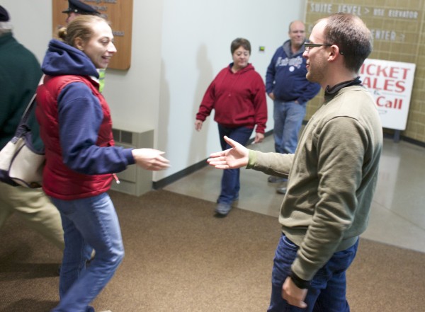 City council candidate Josh Plourde greets voters as they enter to cast their ballots at the Cross Insurance Center Tuesday evening. City council candidate Josh Plourde greets voters as they enter to cast their ballots at the Cross Insurance Center Tuesday evening.