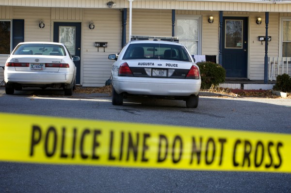 Police tape seals the driveway at an apartment complex on Crosby Street in Augusta Thursday where events transpired Wednesday night ending with the stabbing death of a 24-year-old woman. Police tape seals the driveway at an apartment complex on Crosby Street in Augusta Thursday where events transpired Wednesday night ending with the stabbing death of a 24-year-old woman.