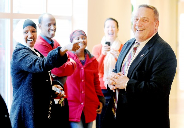 Gov. Paul LePage shares a laugh with Fatuma Hussein at the B Street Community Center in Lewiston on Monday. LePage met with local immigrants to hear about the challenges they face in trying to find employment. Gov. Paul LePage shares a laugh with Fatuma Hussein at the B Street Community Center in Lewiston on Monday. LePage met with local immigrants to hear about the challenges they face in trying to find employment.