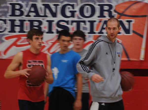 Basketball coach Jon McAllian leads his new team at Bangor Christian in drills on Monday. Basketball coach Jon McAllian leads his new team at Bangor Christian in drills on Monday.