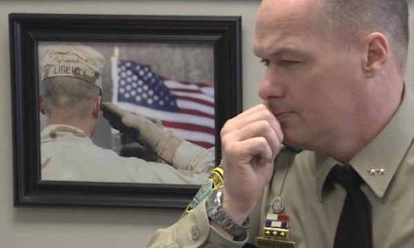 In a still from the 2013 MPBN documentary “A Matter of Duty,” Sheriff Randy Liberty is in his office at the Kennebec County Sheriff’s Department. Liberty opened up about his traumatic wartime experiences in Fallujah and the aftermath upon his return to Maine. After seeking treatment for post-traumatic stress disorder, Liberty worked to establish programs to help veterans incarcerated in his jail get the help they need. In a still from the 2013 MPBN documentary “A Matter of Duty,” Sheriff Randy Liberty is in his office at the Kennebec County Sheriff’s Department. Liberty opened up about his traumatic wartime experiences in Fallujah and the aftermath upon his return to Maine. After seeking treatment for post-traumatic stress disorder, Liberty worked to establish programs to help veterans incarcerated in his jail get the help they need.