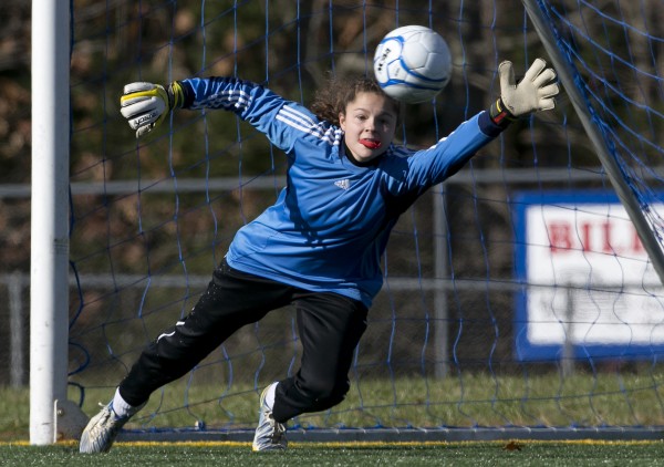Bangor goalie Emily Gilmore reaches in vain as Windham scores their third goal in the second half of the Class A girls soccer state championship, Saturday, Nov. 9, 2013, in Bath, Maine. Bangor goalie Emily Gilmore reaches in vain as Windham scores their third goal in the second half of the Class A girls soccer state championship, Saturday, Nov. 9, 2013, in Bath, Maine.