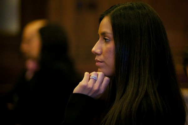 Alexis S. Wright, 29, of Wells listens in Cumberland County Superior Court on Oct. 9, 2012, where she was arraigned on 106 criminal charges. Alexis S. Wright, 29, of Wells listens in Cumberland County Superior Court on Oct. 9, 2012, where she was arraigned on 106 criminal charges.
