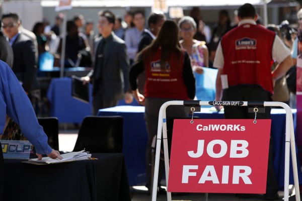Job fair attendees browse displays at Los Angeles City College in October. Given the economic climate, more companies are investing in software instead of adding to their payrolls. Job fair attendees browse displays at Los Angeles City College in October. Given the economic climate, more companies are investing in software instead of adding to their payrolls.