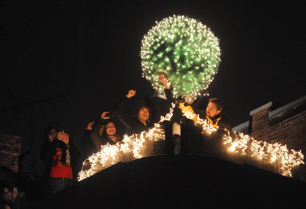 People lift the inflatable ball before throwing it off the top of Paddy Murphy's in downtown Bangor on Saturday, Dec. 31, 2011 to mark the beginning of 2012. People lift the inflatable ball before throwing it off the top of Paddy Murphy's in downtown Bangor on Saturday, Dec. 31, 2011 to mark the beginning of 2012.