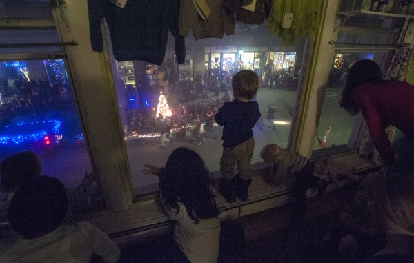 Family and friends of owners Zeth and Betsy Lundy of the Central Street Farmhouse in Bangor watch as the Festival of Lights parade goes by Saturday, Dec. 7, 2013. Family and friends of owners Zeth and Betsy Lundy of the Central Street Farmhouse in Bangor watch as the Festival of Lights parade goes by Saturday, Dec. 7, 2013.