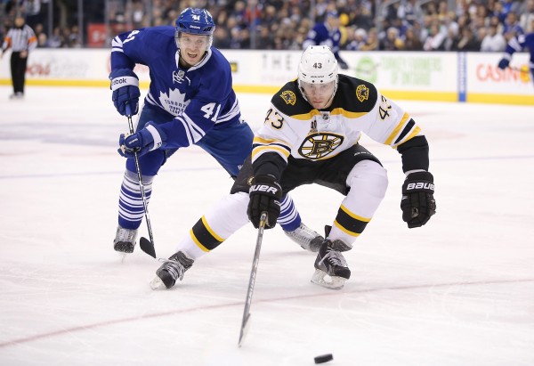 Boston Bruins defenseman Matt Barykowski chases the puck as Toronto Maple Leafs left wing Nikolai Kulemin applies pressure at the Air Canada Centre Sunday night in Toronto. The Bruins won 5-2. Boston Bruins defenseman Matt Barykowski chases the puck as Toronto Maple Leafs left wing Nikolai Kulemin applies pressure at the Air Canada Centre Sunday night in Toronto. The Bruins won 5-2.