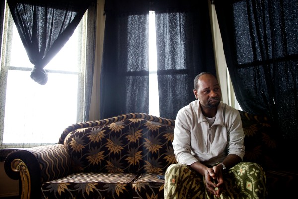 Abdi Maalin, a father of 15 children sits alone in his Lewiston apartment on New Year's Eve. His wife, Salima Nuh, 37, whom he met in a Kenyan refugee camp, was killed Dec. 8 in a head-on collision on Route 196 in Topsham. Abdi Maalin, a father of 15 children sits alone in his Lewiston apartment on New Year's Eve. His wife, Salima Nuh, 37, whom he met in a Kenyan refugee camp, was killed Dec. 8 in a head-on collision on Route 196 in Topsham.