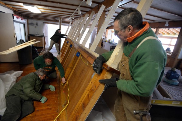 Andy Hazen (right) holds up a wall while working on renovations inside the Lobster Pound with Dick McLaughlin, Jim Tyler and Ben Hazen (background). The Hazens, owners of Andrews Brewing Co., have gone into business with McLaughlin, owner of the Lobster Pound, and the new Lobster Pound Inc. will reopen in May with the brewery inside. Andy Hazen (right) holds up a wall while working on renovations inside the Lobster Pound with Dick McLaughlin, Jim Tyler and Ben Hazen (background). The Hazens, owners of Andrews Brewing Co., have gone into business with McLaughlin, owner of the Lobster Pound, and the new Lobster Pound Inc. will reopen in May with the brewery inside.