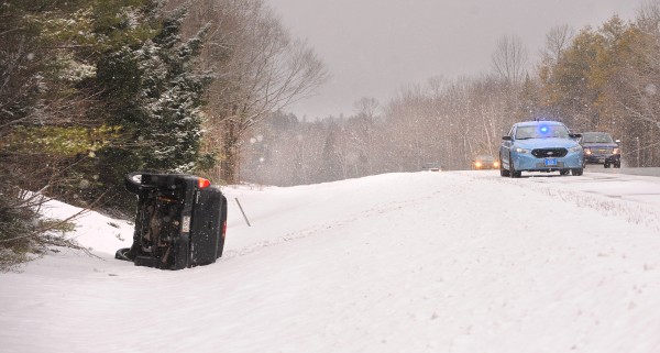 This pickup truck slid off the road and rolled over in the northbound lane of I-95 in Carmel on Saturday. This pickup truck slid off the road and rolled over in the northbound lane of I-95 in Carmel on Saturday.