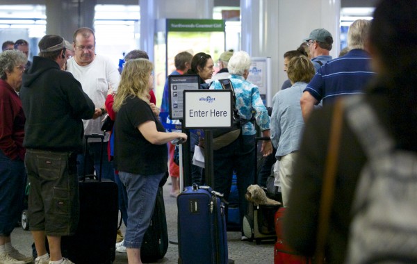 Travelers at Bangor International Airport in September. Travelers at Bangor International Airport in September.