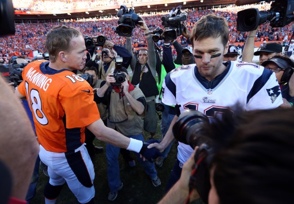 Denver Broncos quarterback Peyton Manning (18) and New England Patriots quarterback Tom Brady (12) shake hands after the AFC championship game Sunday at Sports Authority Field in Denver. Denver Broncos quarterback Peyton Manning (18) and New England Patriots quarterback Tom Brady (12) shake hands after the AFC championship game Sunday at Sports Authority Field in Denver.