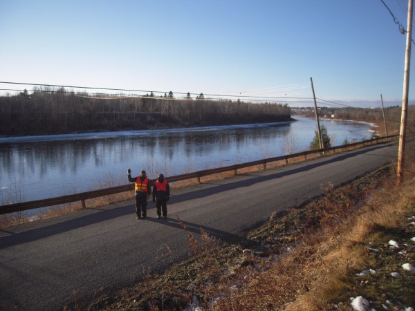 Long-distance hikers Larry Berz and Dr. Narayana Prasana head toward Limestone along the Aroostook River in Caribou on Dec. 8. Long-distance hikers Larry Berz and Dr. Narayana Prasana head toward Limestone along the Aroostook River in Caribou on Dec. 8.