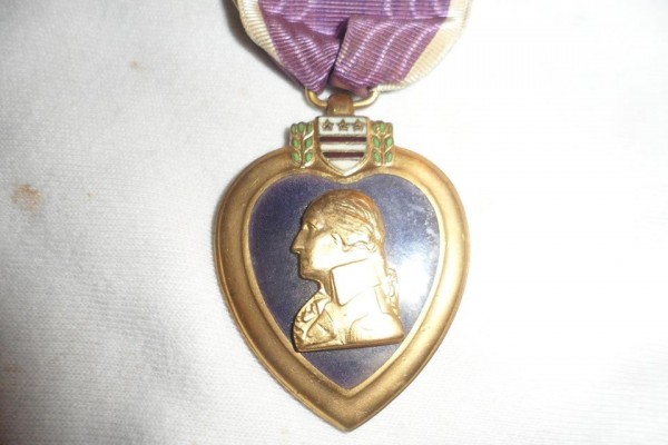 This is the Purple Heart medal awarded to Pfc. Frank Conroy, who received it for injuries he suffered in France during WWI. The medal is being returned to his family, thanks to a Vermont woman who came into possession of it and a nonprofit group that reunites lost or stolen medals with their rightful owners. This is the Purple Heart medal awarded to Pfc. Frank Conroy, who received it for injuries he suffered in France during WWI. The medal is being returned to his family, thanks to a Vermont woman who came into possession of it and a nonprofit group that reunites lost or stolen medals with their rightful owners.