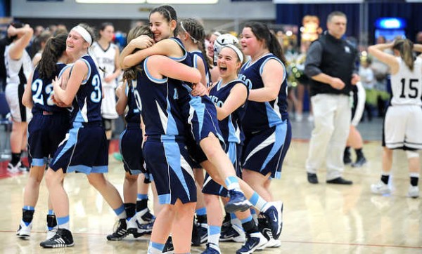 Dirigo's Kelsey Wilson, center left and Emma Lueders hug after a last minute comeback against Saint Dominic Academy during Wednesday afternoon's Western Class C quarterfinals girls basketball game at the Augusta Civic Center. Dirigo's Kelsey Wilson, center left and Emma Lueders hug after a last minute comeback against Saint Dominic Academy during Wednesday afternoon's Western Class C quarterfinals girls basketball game at the Augusta Civic Center.