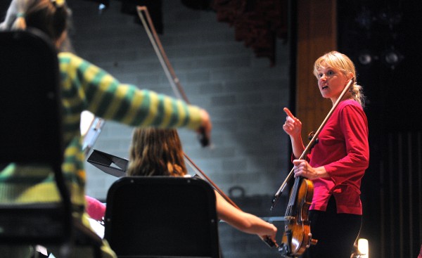 In this October 2013 file photo, Prelude String Orchestra conductor Sascha Zaburdaeva speaks with the musicians during rehearsal at the Bangor High School. Zaburdaeva and Trevor Marcho share conducting duties at the Bangor Symphony Youth Orchestra. In this October 2013 file photo, Prelude String Orchestra conductor Sascha Zaburdaeva speaks with the musicians during rehearsal at the Bangor High School. Zaburdaeva and Trevor Marcho share conducting duties at the Bangor Symphony Youth Orchestra.