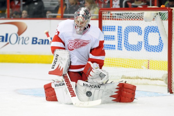 Detroit Red Wings goalie Jimmy Howard makes a save against the Washington Capitals at the Verizon Center in Washington Feb. 2. Howard, a former University of Maine player, will be competing for Team USA in the Sochi Olympics. Detroit Red Wings goalie Jimmy Howard makes a save against the Washington Capitals at the Verizon Center in Washington Feb. 2. Howard, a former University of Maine player, will be competing for Team USA in the Sochi Olympics.