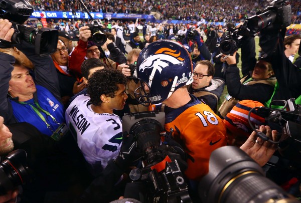 Seattle Seahawks quarterback Russell Wilson (3) shakes hands with Denver Broncos quarterback Peyton Manning (18) after Super Bowl XLVIII at MetLife Stadium on Sunday night. Seattle Seahawks quarterback Russell Wilson (3) shakes hands with Denver Broncos quarterback Peyton Manning (18) after Super Bowl XLVIII at MetLife Stadium on Sunday night.