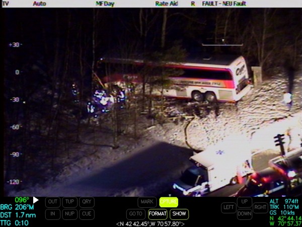 This photograph of the Tuesday, Feb. 26, 2013 accident night involving a Cyr Bus Lines motor coach carrying members of the University of Maine women's basketball team was taken from a Massachusetts State Police Air Wing helicopter. This photograph of the Tuesday, Feb. 26, 2013 accident night involving a Cyr Bus Lines motor coach carrying members of the University of Maine women's basketball team was taken from a Massachusetts State Police Air Wing helicopter.