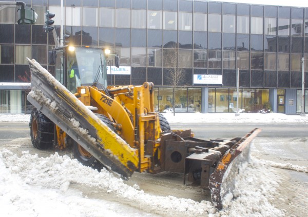 In this February 2014 file photo, plows clear the streets in downtown Bangor after a storm that brought several inches of snow mixed with rain. The storm created slush and icy conditions throughout the Bangor area. In this February 2014 file photo, plows clear the streets in downtown Bangor after a storm that brought several inches of snow mixed with rain. The storm created slush and icy conditions throughout the Bangor area.