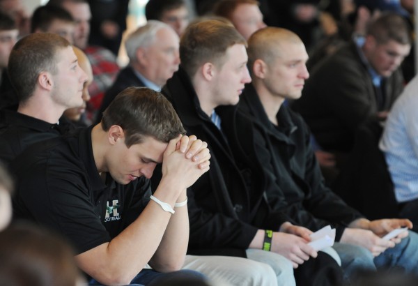 Husson football tight end Caleb King reflects during a service of remembrance for Stephen Colvin on Friday at Husson. Colvin was killed in a skiing accident at Sugarloaf on Tuesday. Husson football tight end Caleb King reflects during a service of remembrance for Stephen Colvin on Friday at Husson. Colvin was killed in a skiing accident at Sugarloaf on Tuesday.