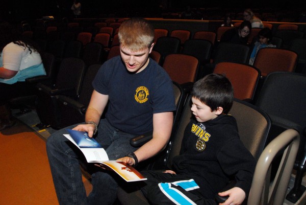 Brewer High School senior Joshua Lugdon, who lives in Dedham, reads "The Adventures of Blake" with Blake, a Brewer Community School first-grader. After Blake wrote a letter to Brewer High students enrolled in creative writing classes taught at Michelle Macdonald and Kevin Napolillo, Lugdon transformed the letter into a story book featuring Blake as the main character. Brewer High School senior Joshua Lugdon, who lives in Dedham, reads "The Adventures of Blake" with Blake, a Brewer Community School first-grader. After Blake wrote a letter to Brewer High students enrolled in creative writing classes taught at Michelle Macdonald and Kevin Napolillo, Lugdon transformed the letter into a story book featuring Blake as the main character.