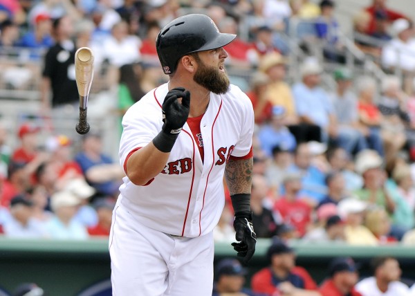 Boston Red Sox first baseman Mike Napoli (12) flips his bat after hitting a solo home run against the Minnesota Twins during their game at JetBlue Park on Saturday. Boston Red Sox first baseman Mike Napoli (12) flips his bat after hitting a solo home run against the Minnesota Twins during their game at JetBlue Park on Saturday.