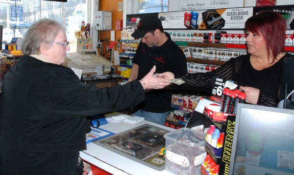 Madawaska's Megabucks winner Jeanne Gagnon purchases this week's ticket from Susan Williams, owner of Bob's Neighborhood Store, where she purchased her her $3 million ticket two weeks ago with her husband, Robert Gagnon. Madawaska's Megabucks winner Jeanne Gagnon purchases this week's ticket from Susan Williams, owner of Bob's Neighborhood Store, where she purchased her her $3 million ticket two weeks ago with her husband, Robert Gagnon.