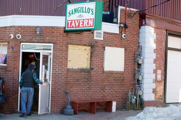 Patrons enter Sangillo's Tavern on Hampshire Street in Portland on Monday. The City Council debated renewing Sangillo's liquor license Monday night. Patrons enter Sangillo's Tavern on Hampshire Street in Portland on Monday. The City Council debated renewing Sangillo's liquor license Monday night.