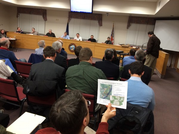 An Orono resident looks at a map of the proposed site for a 270-unit student housing development planned for the end of Washburn Drive. Town planners held a public hearing on the project Wednesday, March 19, 2014, and voted to continued the hearing at the next meeting in April. An Orono resident looks at a map of the proposed site for a 270-unit student housing development planned for the end of Washburn Drive. Town planners held a public hearing on the project Wednesday, March 19, 2014, and voted to continued the hearing at the next meeting in April.