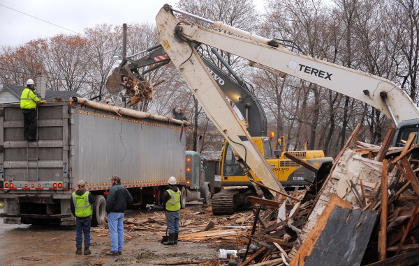 Crews demolish buildings last year on First Street in Bangor. Crews demolish buildings last year on First Street in Bangor.