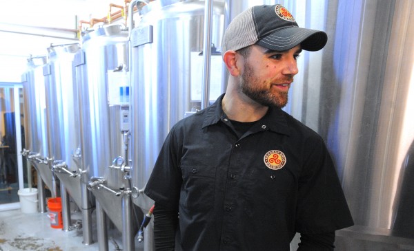Andrew Geaghan co-owner and brewer at Geaghan Brothers Brewing Co. said that the company gives the spent grains from the brewery to a local farmer for free. Andrew Geaghan co-owner and brewer at Geaghan Brothers Brewing Co. said that the company gives the spent grains from the brewery to a local farmer for free.